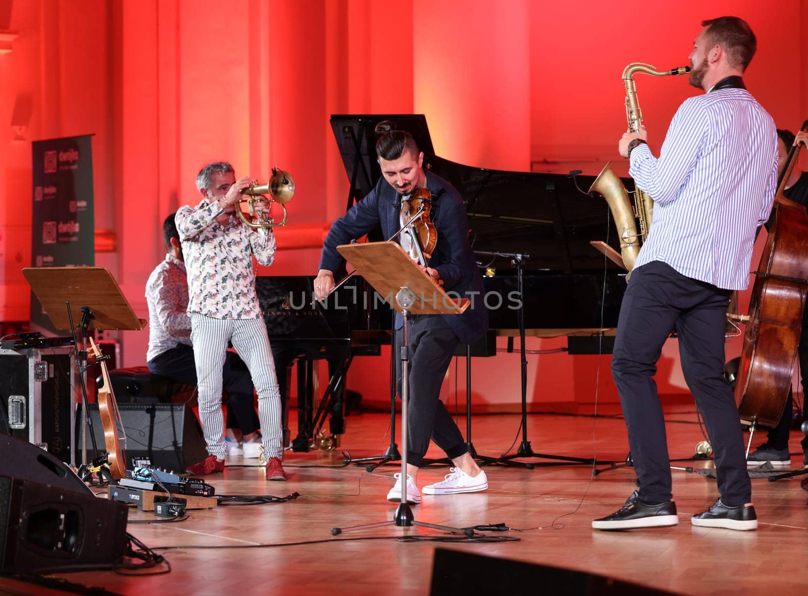 Cracow, Poland - July 4, 2022: Adam Baldych Quartet and Paolo Fresu live on stage of  Krakow Philharmonic at Summer Jazz Festival in Cracow, Poland