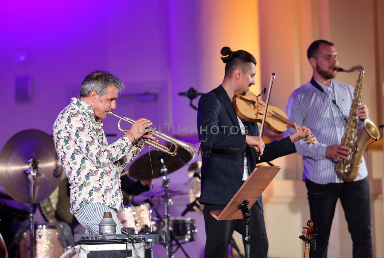 Cracow, Poland - July 4, 2022: Adam Baldych Quartet and Paolo Fresu live on stage of  Krakow Philharmonic at Summer Jazz Festival in Cracow, Poland
