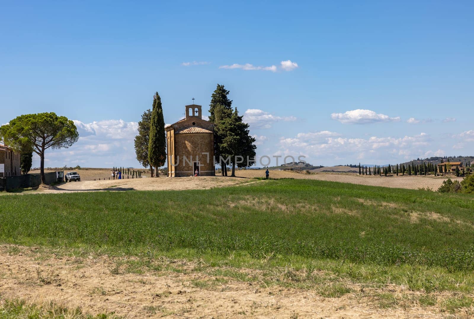 Pienza, Italy - September 12, 2022: Capella Di Vitaleta in countryside between San Quirico and Pienza in Val d Orcia Tuscany. Italy