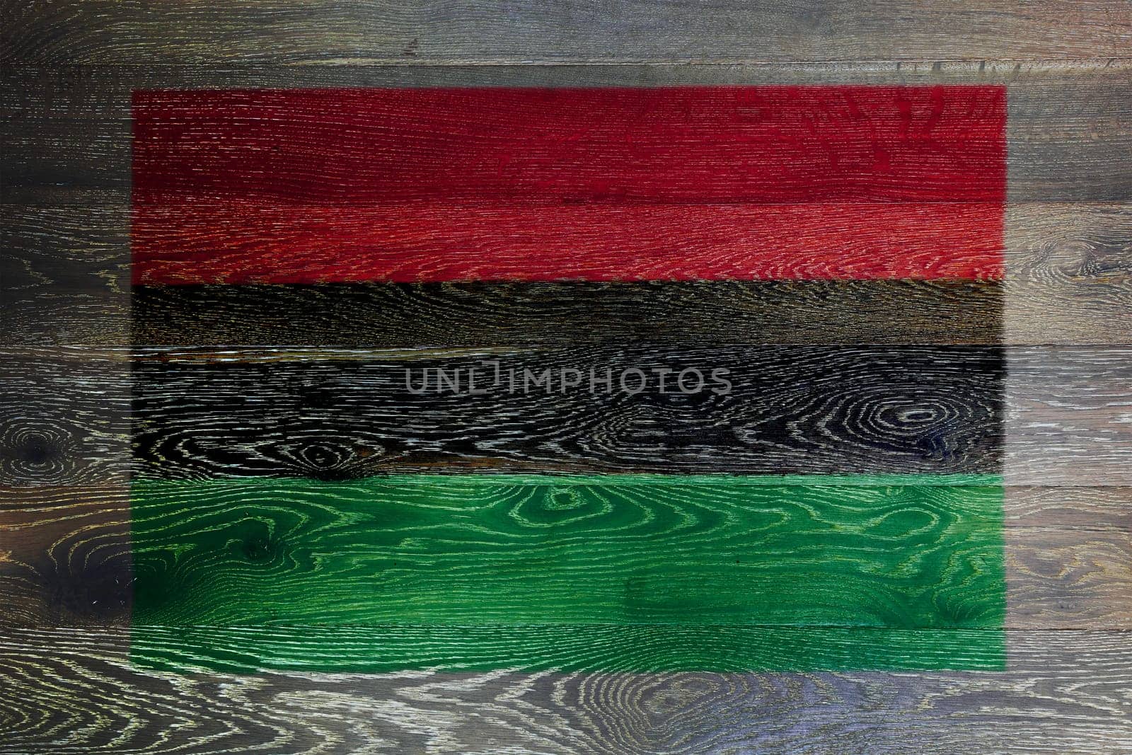 An African American flag on rustic old wood surface background