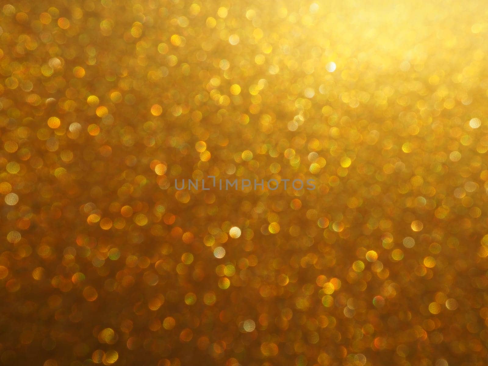 Bokeh light of gold glitters. Golden glitter texture background. Sparkling glitter wrapping paper with sequins and sparkles. Festive golden bokeh and glitter. Beautiful background
