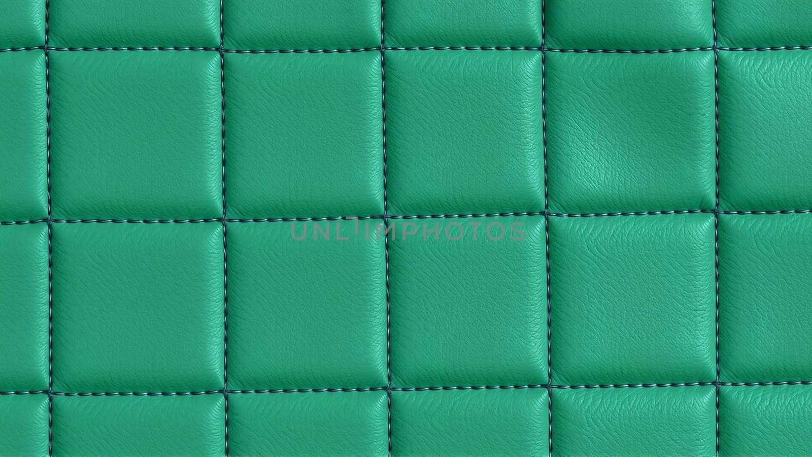 Green artificial leather surface texture, stitched in the form of rhombuses, squares, rectangles. Quilted eco-leather. High quality photo