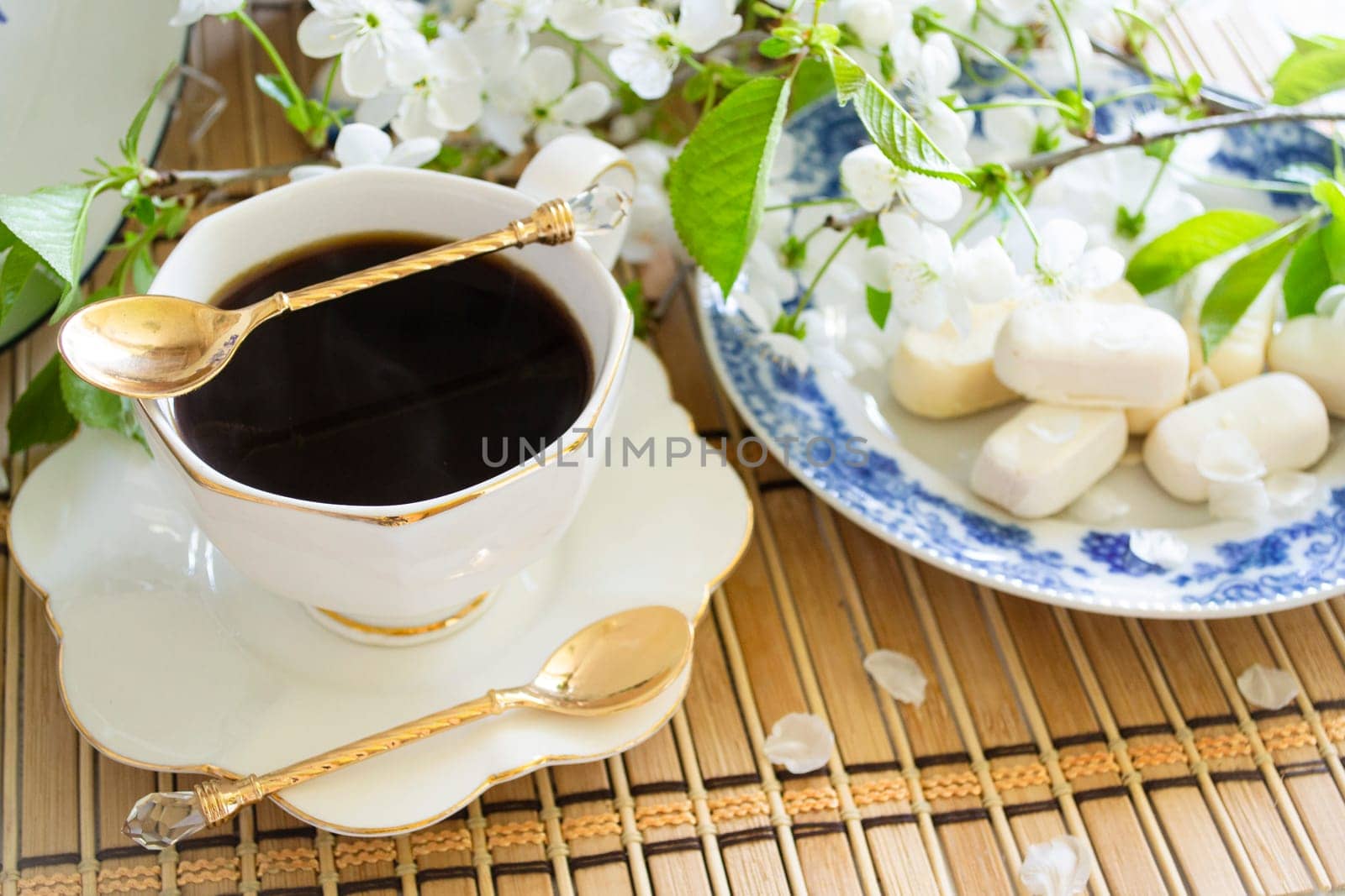 Cup of americano coffee in the morning, romantic white and blue colors