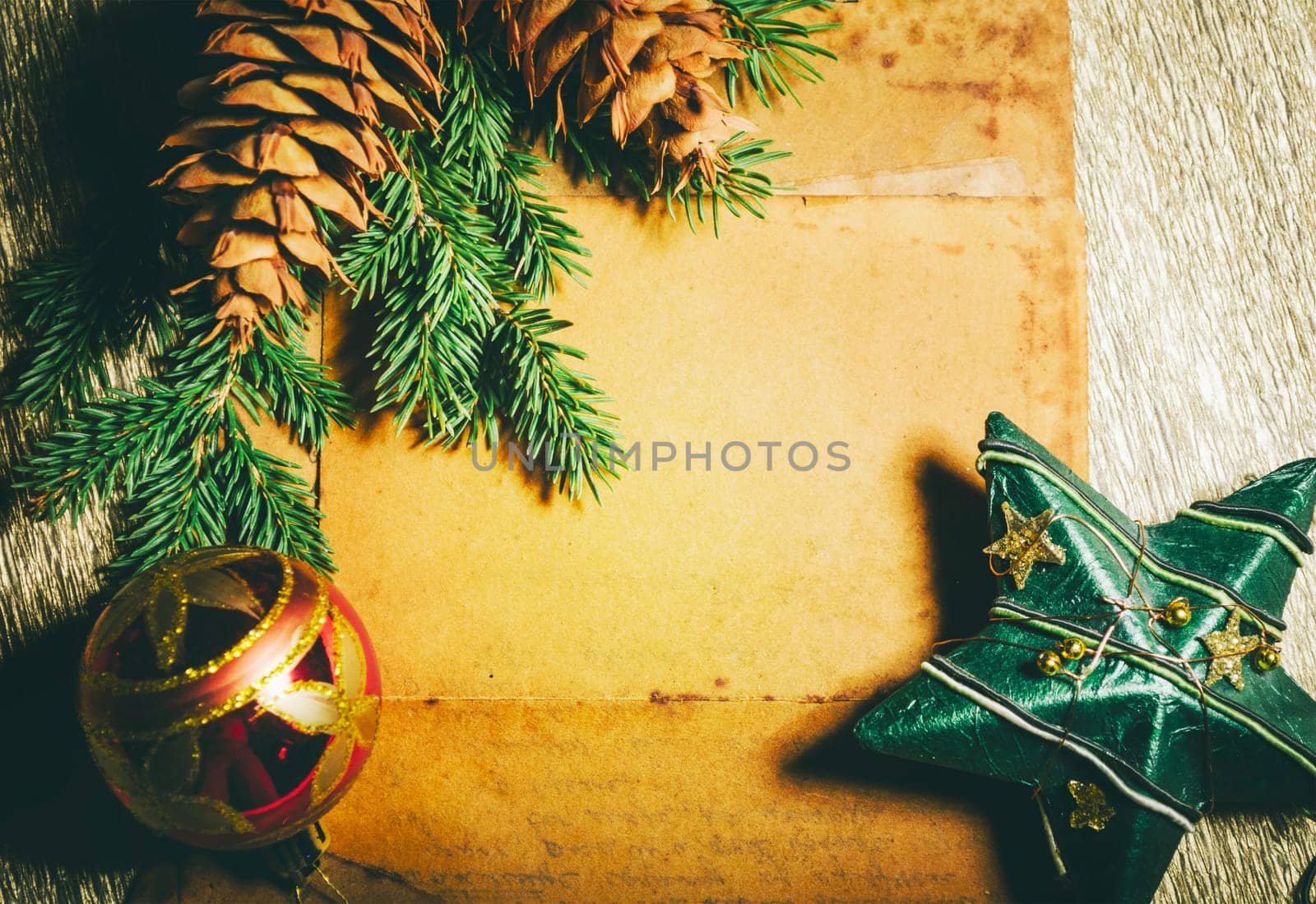 Christmas holiday paper background with fir tree and christmas decoration top view design. Xmas frame for new year wish list letter to santa. Merry Christmas empty card.