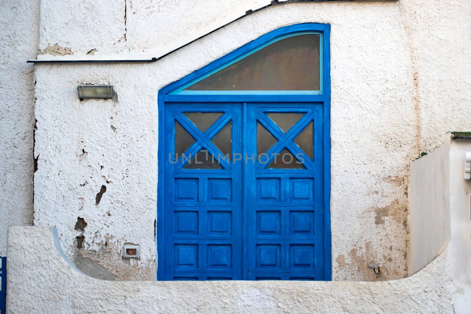 Procida island with colorful houses in small town street