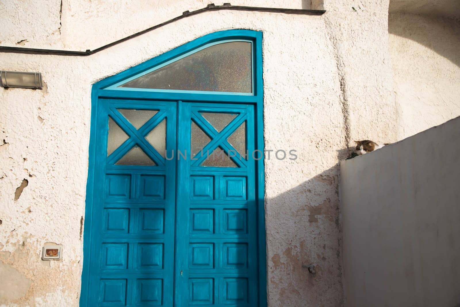 Procida island with colorful houses in small town street