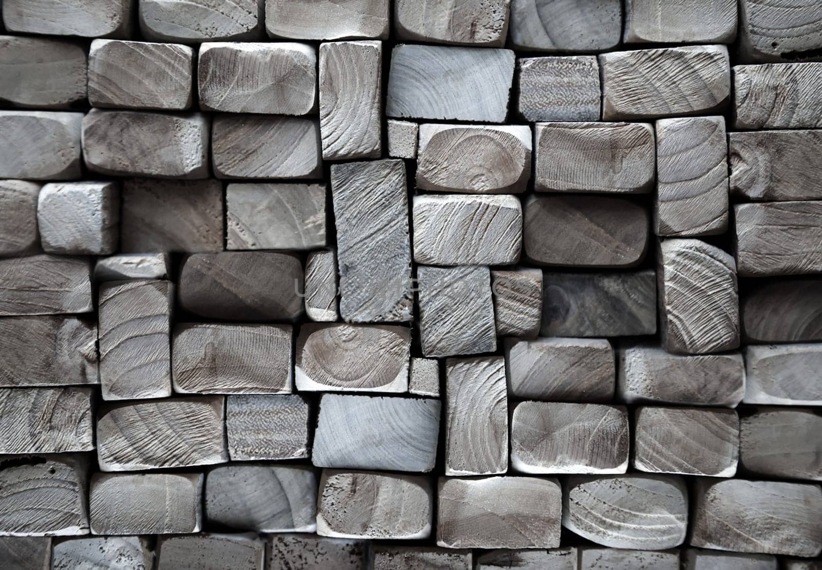 A texture of wood. Many stacked wooden slats from the front side.