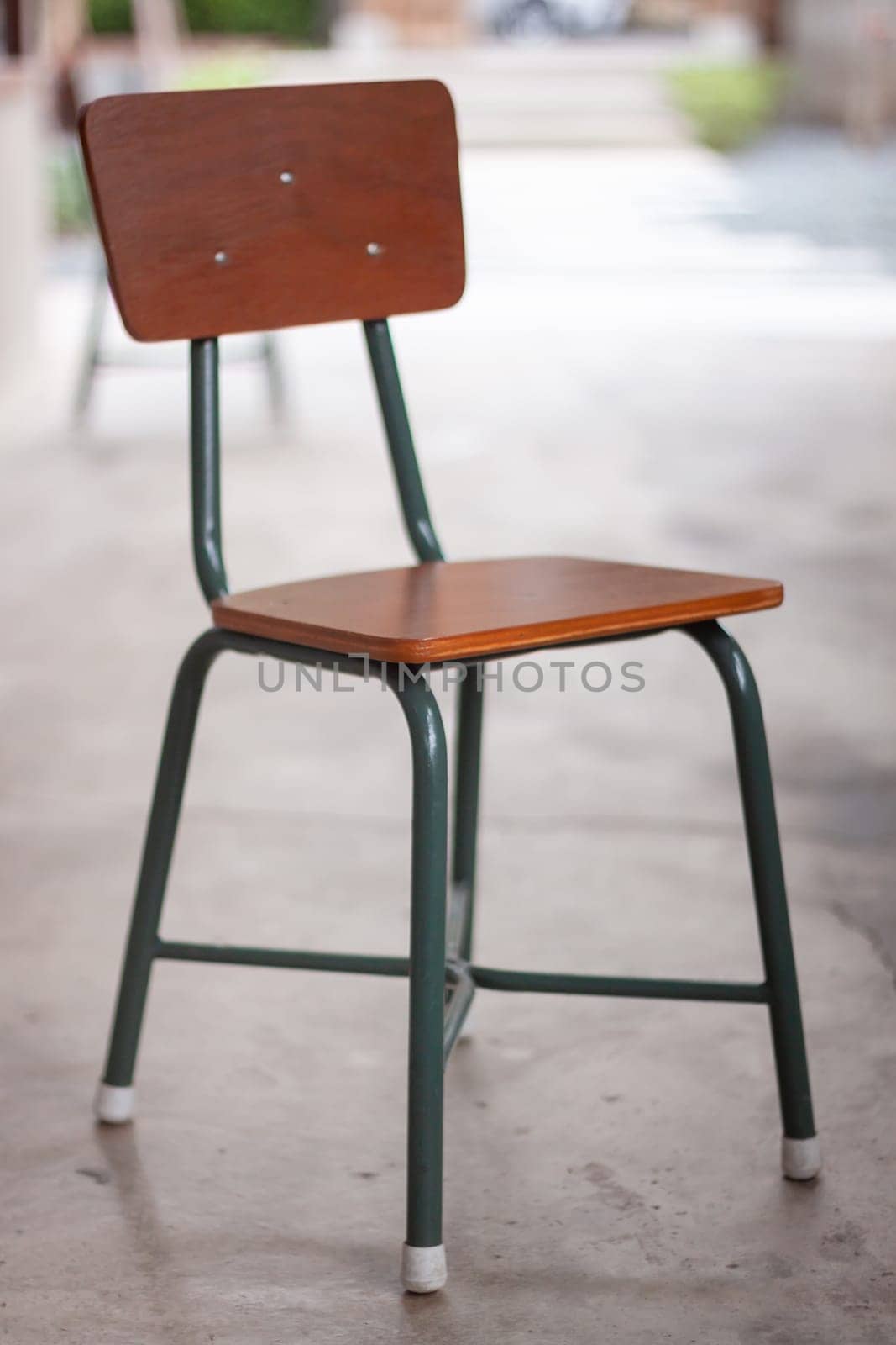 Wooden chair decorated in coffee shop, stock photo