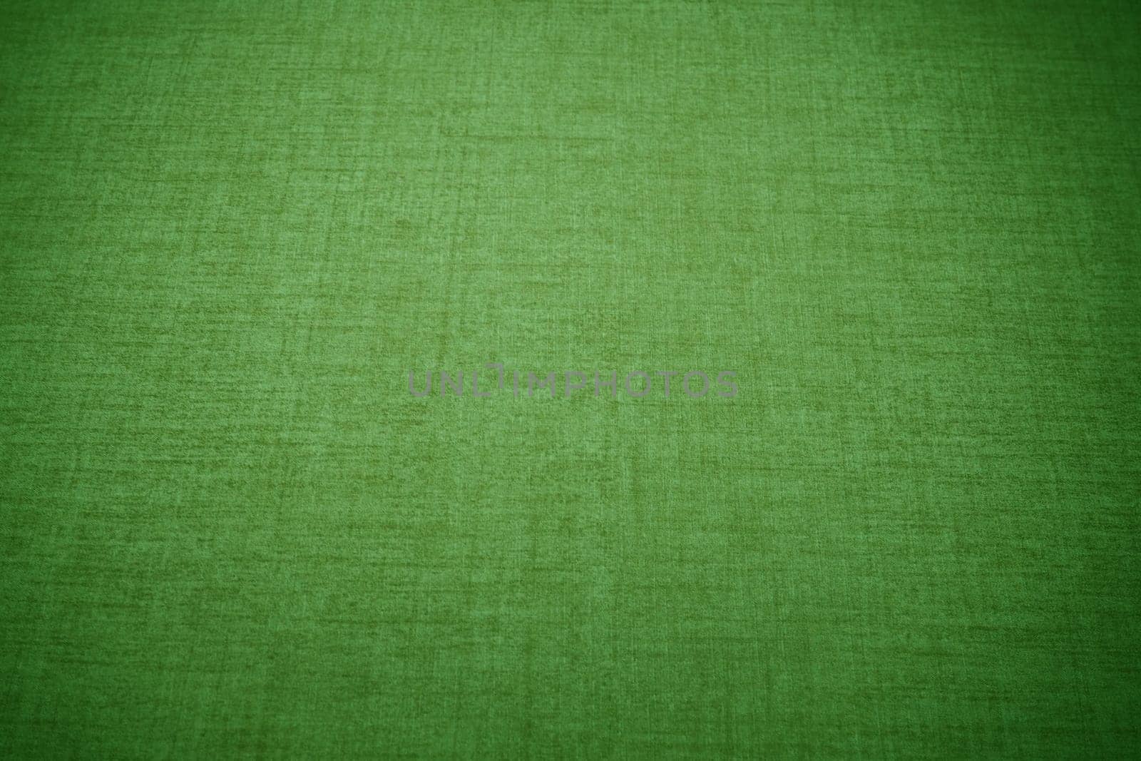 bright green linen fabric texture with vignette for the background.