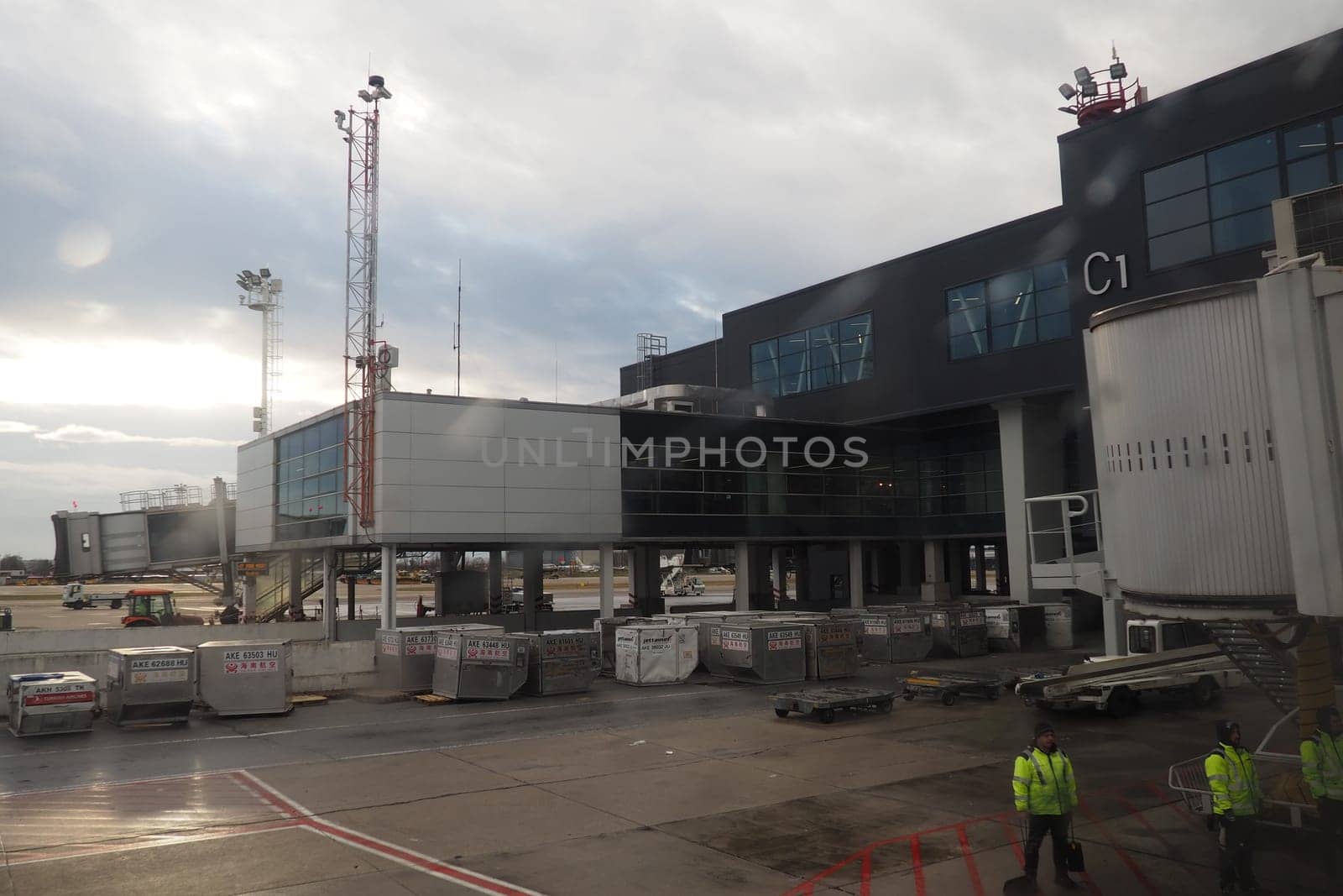 Belgrade, Serbia, January 19, 2023. Shot from the window of an aircraft moving across the airfield. Terminals and buildings of the airport Nikola Tesla in Surcin. International flights in the Balkans