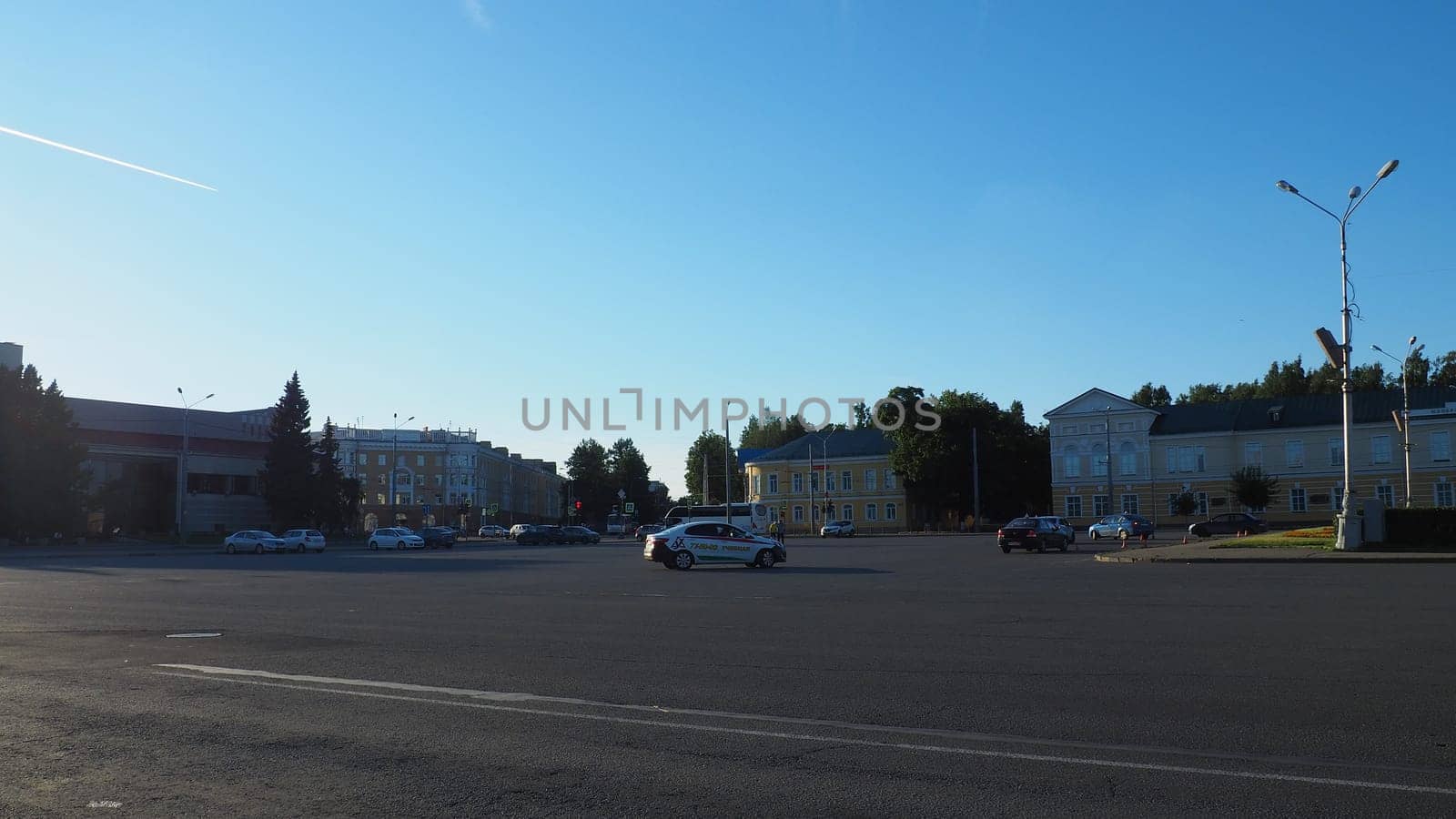 Petrozavodsk, Karelia August 3, 2022. Kirov Square, intersection with Karl Marx Avenue and Kuibyshev Street. The building of the National Theater of the Republic of Karelia. Cars and passers-by