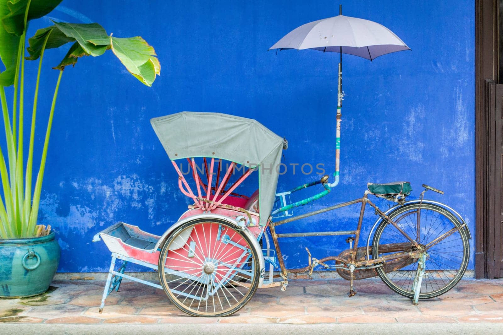 Penang, Malaysia, May 2014: Front picture of the ricksha's at the Blue Mansion (Cheong Fatt Tze Mansion) in Georgetown, Penang.