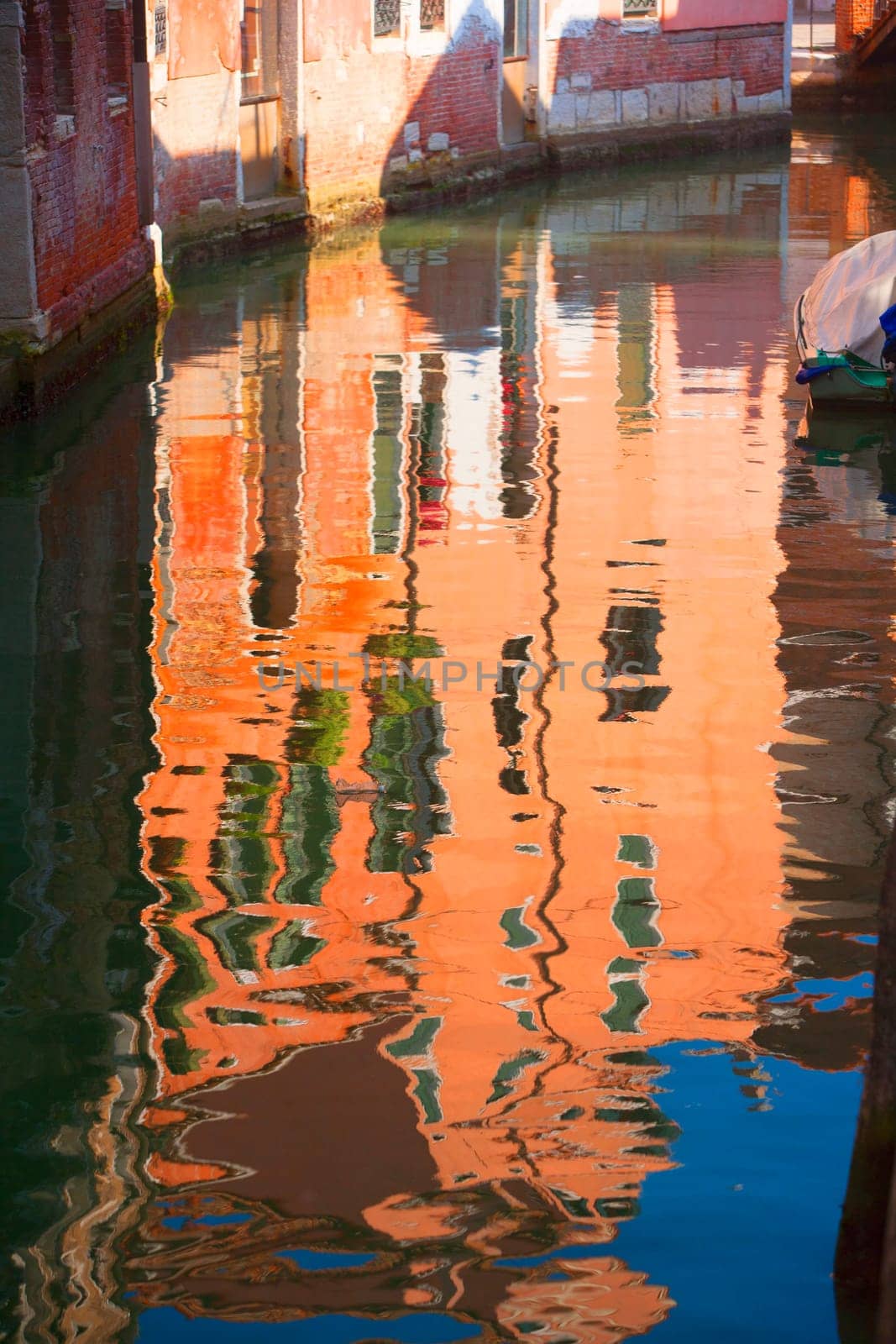 Reflections no the canals of Venice, Italy.