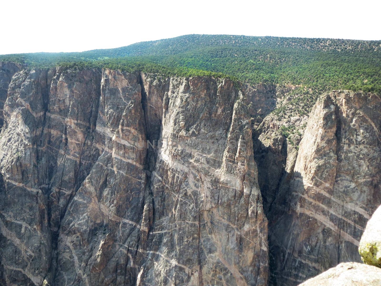 Greological time is shown in the layers of rock at Black Canyon National Park, Gunnerson, Colorado.