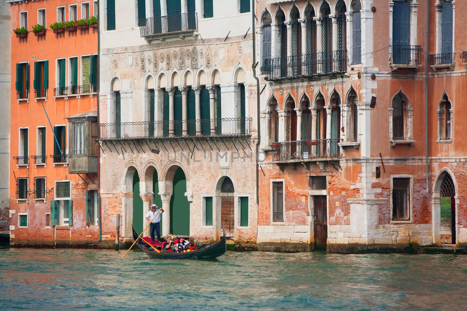 A gondola floats down the Grand Canal in Venice, Italy