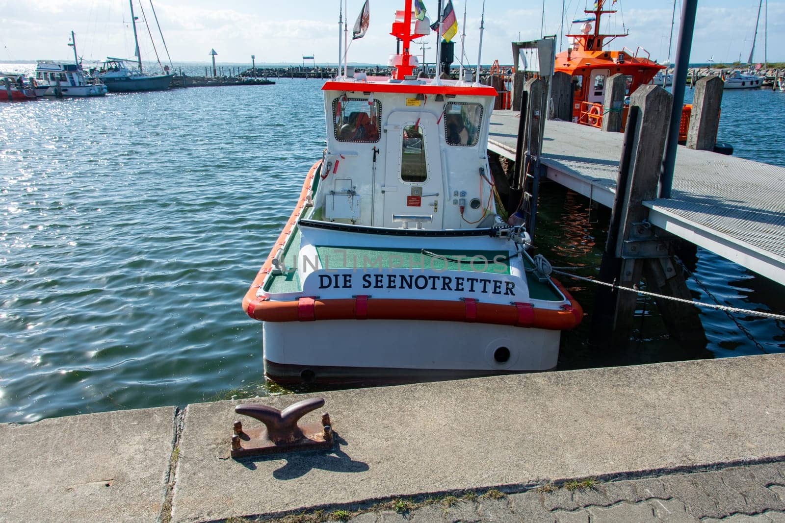Harbour in Timmendorf Strand, Germany, September 9, 2022 - Sea rescue boat in the harbour, Germany at Timmendorf Strand, on the island of Poel, Mecklenburg-West Pomerania