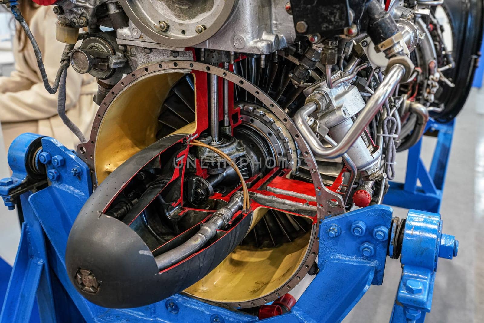 Older Russian helicopter from 80s era motor turboshaft or engine cut through detail - displayed at weapons exhibition.