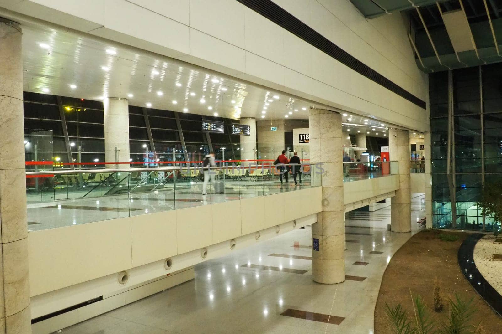 Ankara, Turkiye, Esenboga Havalimani Airport, 01.18.2023 lobby or corridor at the airport for the transit of passengers who have passed check-in. Airport interior. Shops, cafes and trees. Turkey.