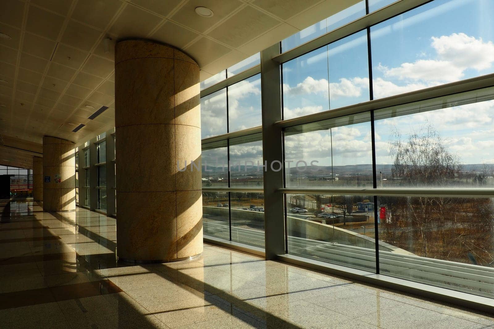 Ankara, Turkey, Esenboga Khavalimani Airport, 01/18/2023 lobby or corridor at the airport for the transit of passengers who have passed screening. Airport interior. Glass windows and sunlight. Turkiye