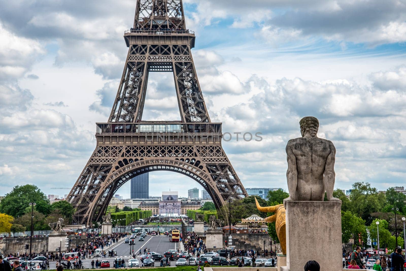 View of the Eiffel Tower from Trocadero Garden, a stone Sculpture of the Garden in the foreground, Paris, France