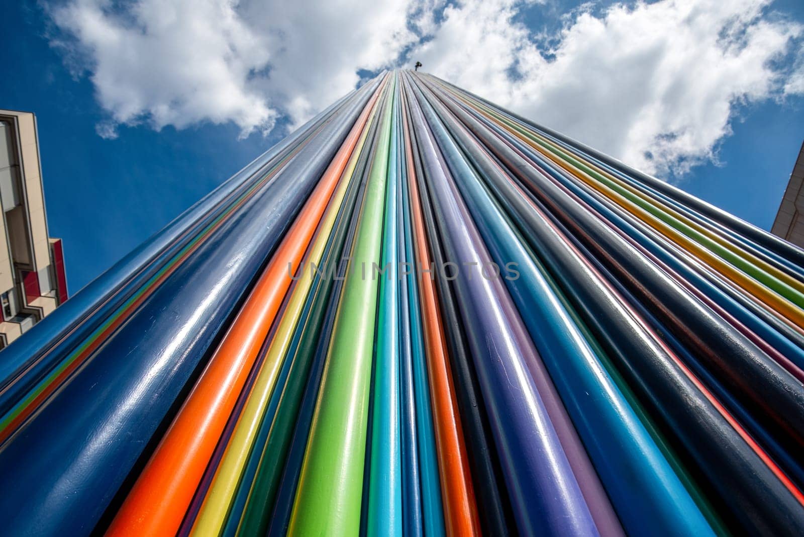 Artistic Installation of Rainbow colored Tubes in La Defense District in Paris France