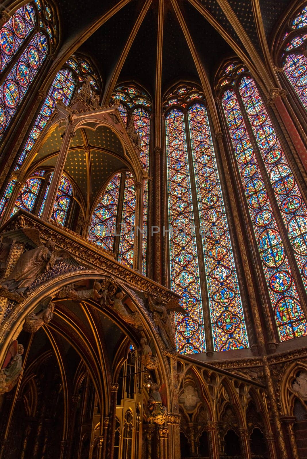 The inside of the famous Sainte Chapelle in Paris with impressing colorful windows, France