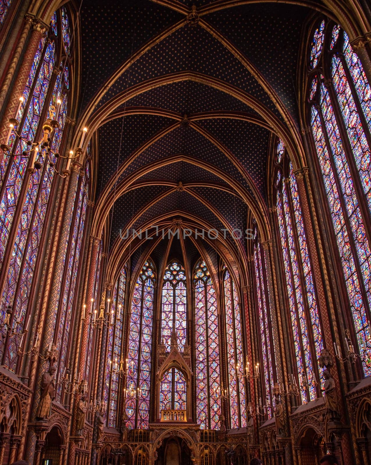 The inside of the famous Sainte Chapelle in Paris with impressing colorful windows, France