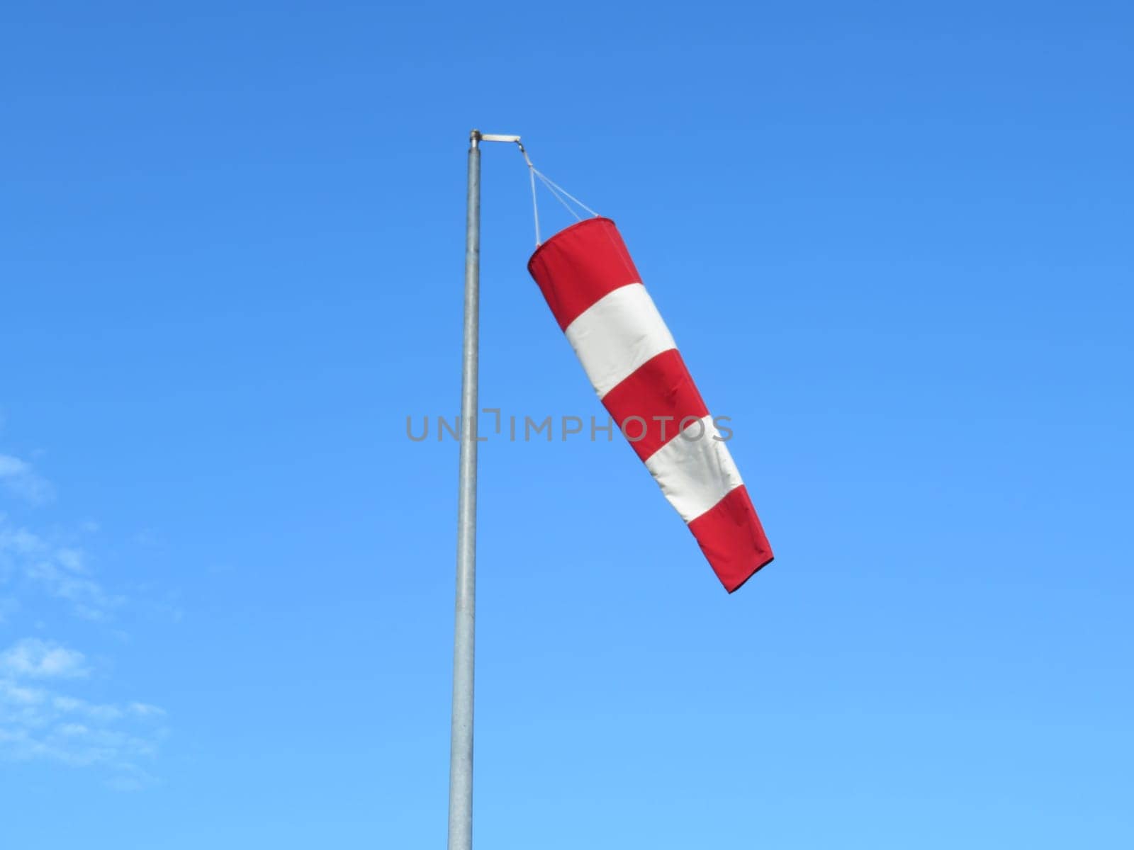 red and white wind indicator safety signal warning