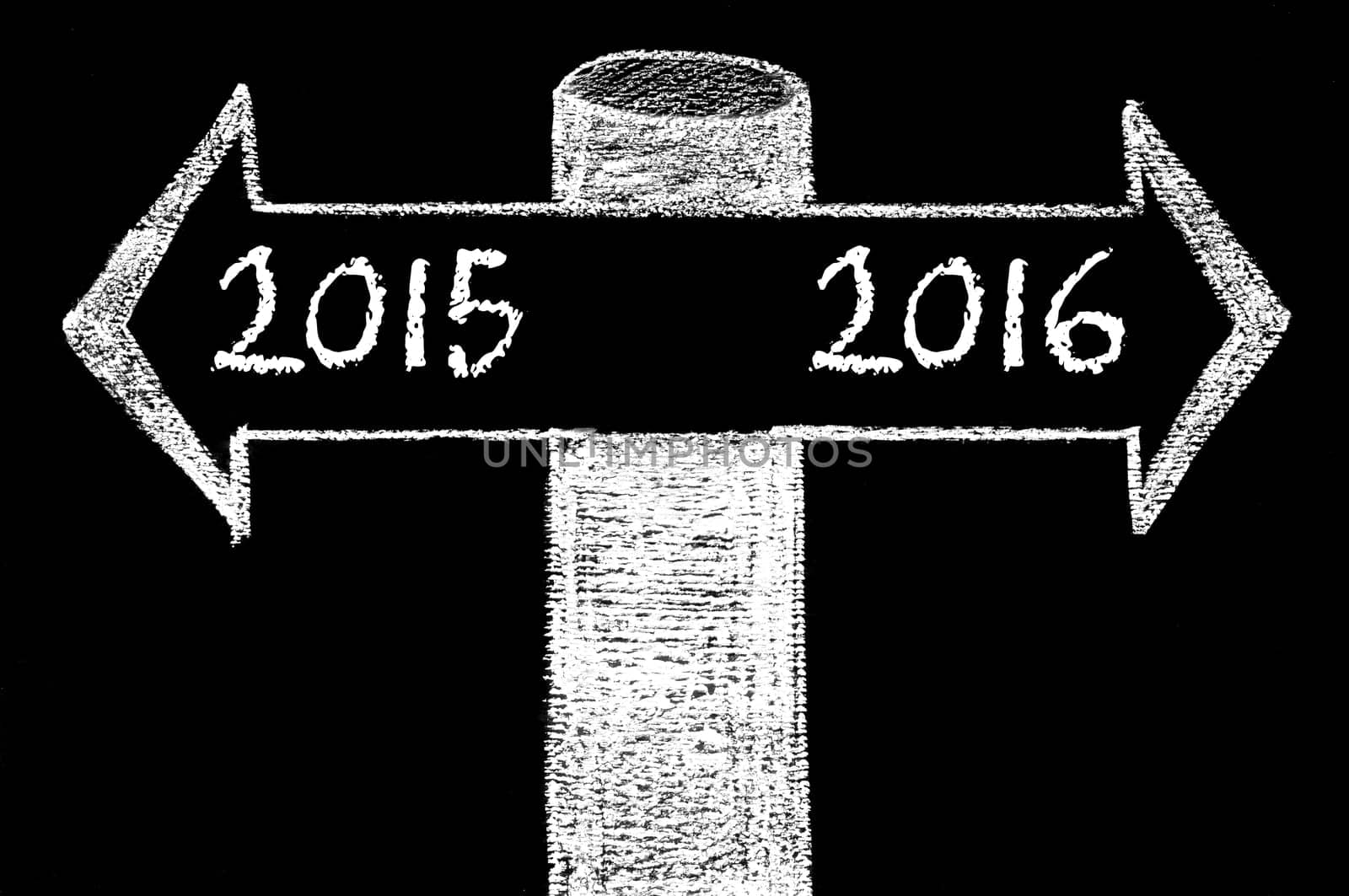 Opposite arrows with Year 2015 versus Year 2016. Hand drawing with chalk on blackboard. Choice conceptual image