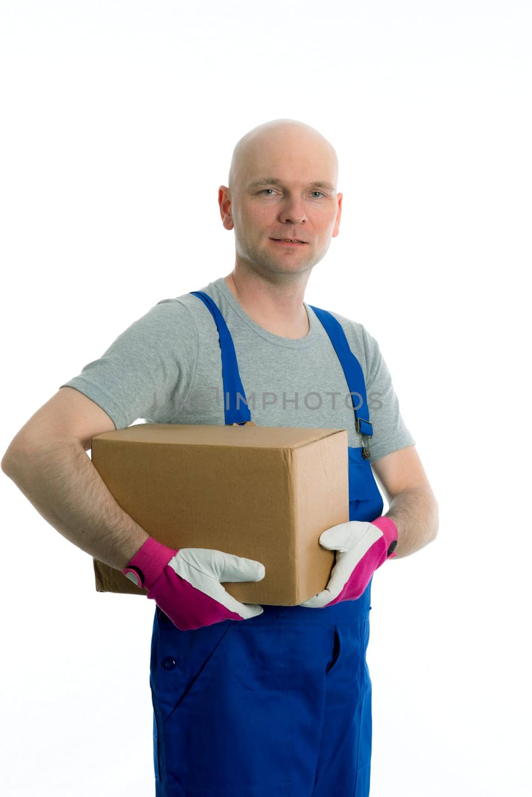 young man in flap trousers with cardboard in front of white background