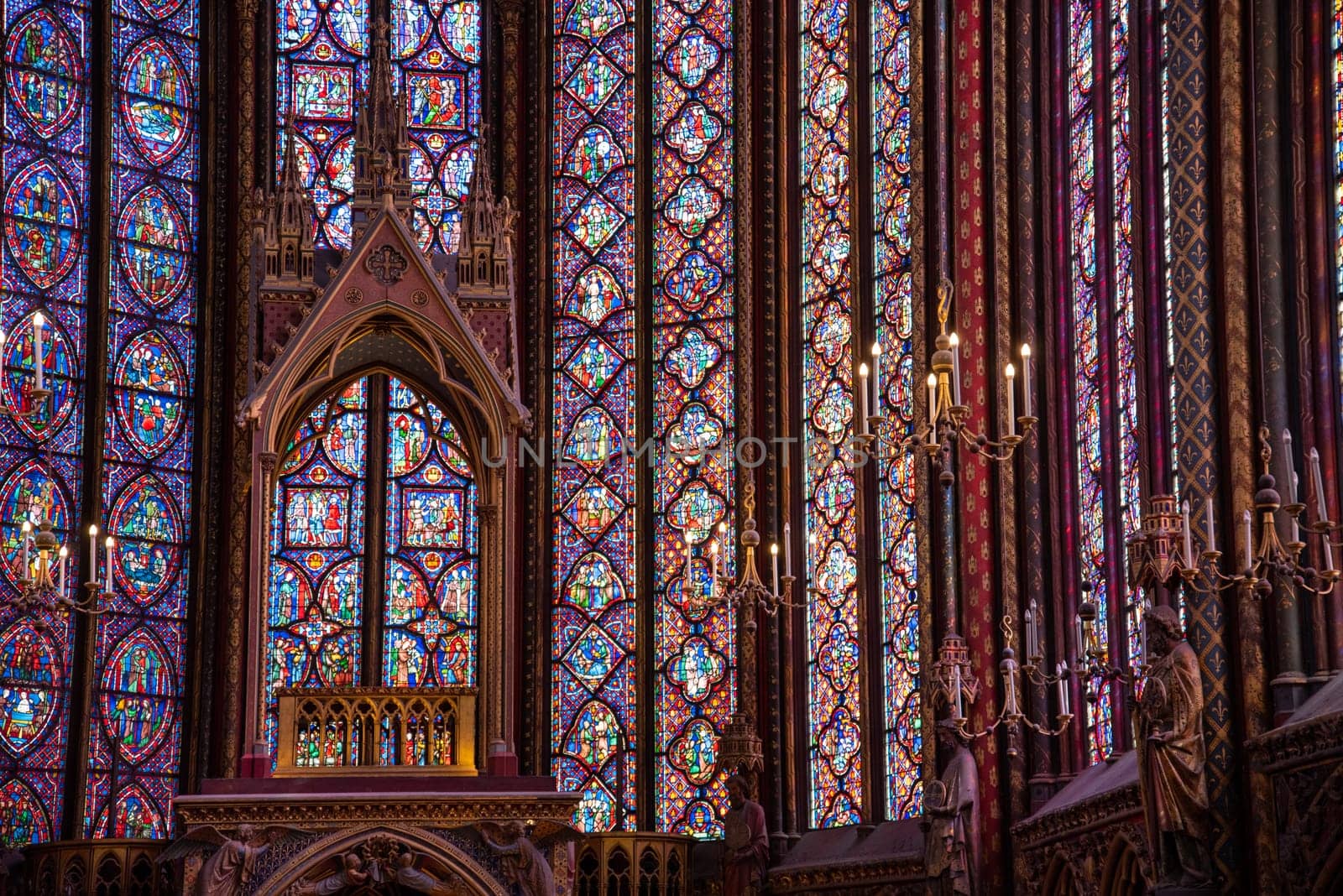 The inside of the famous Sainte Chapelle in Paris with impressing colorful windows, France