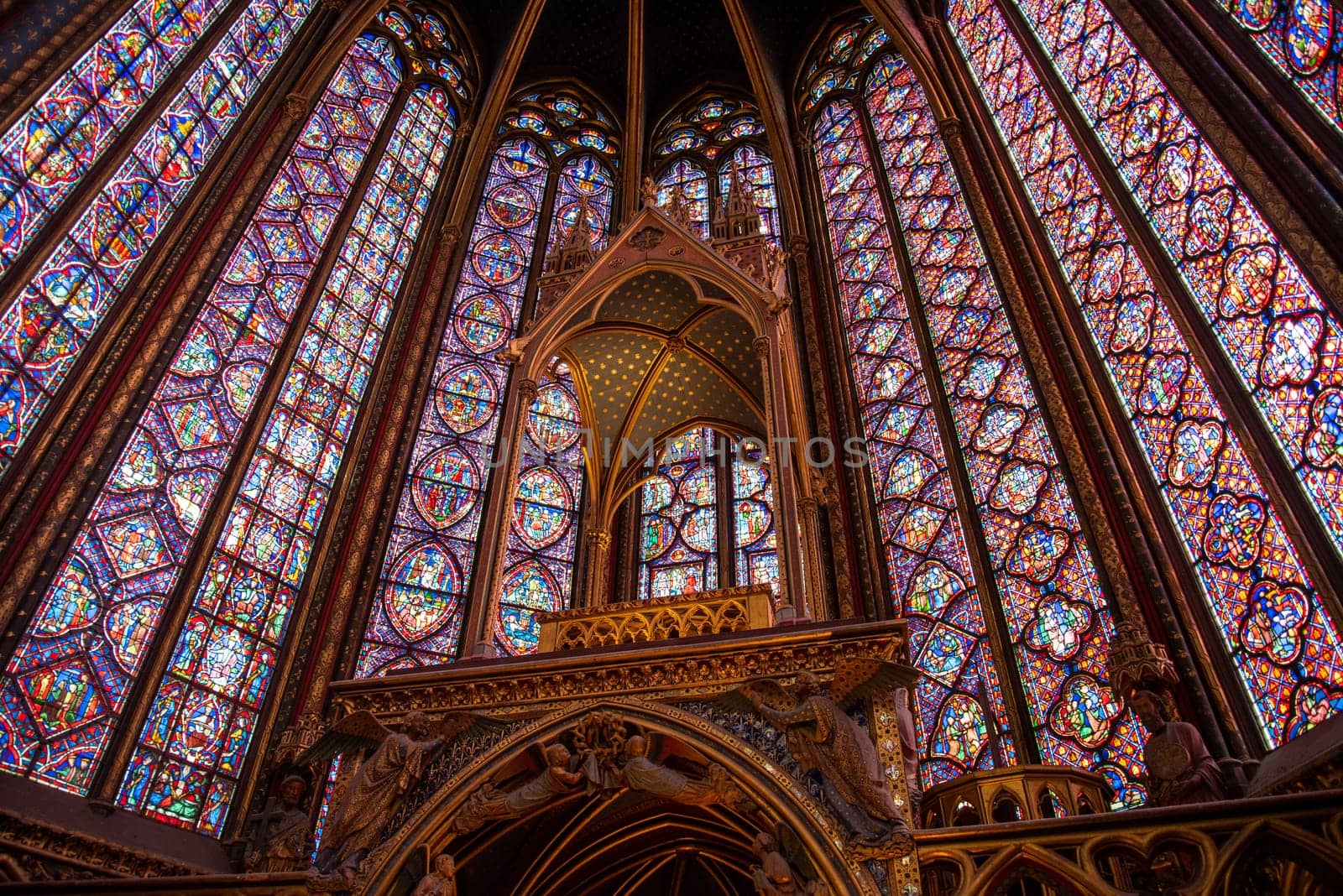 The inside of the famous Sainte Chapelle in Paris with impressing colorful windows, France