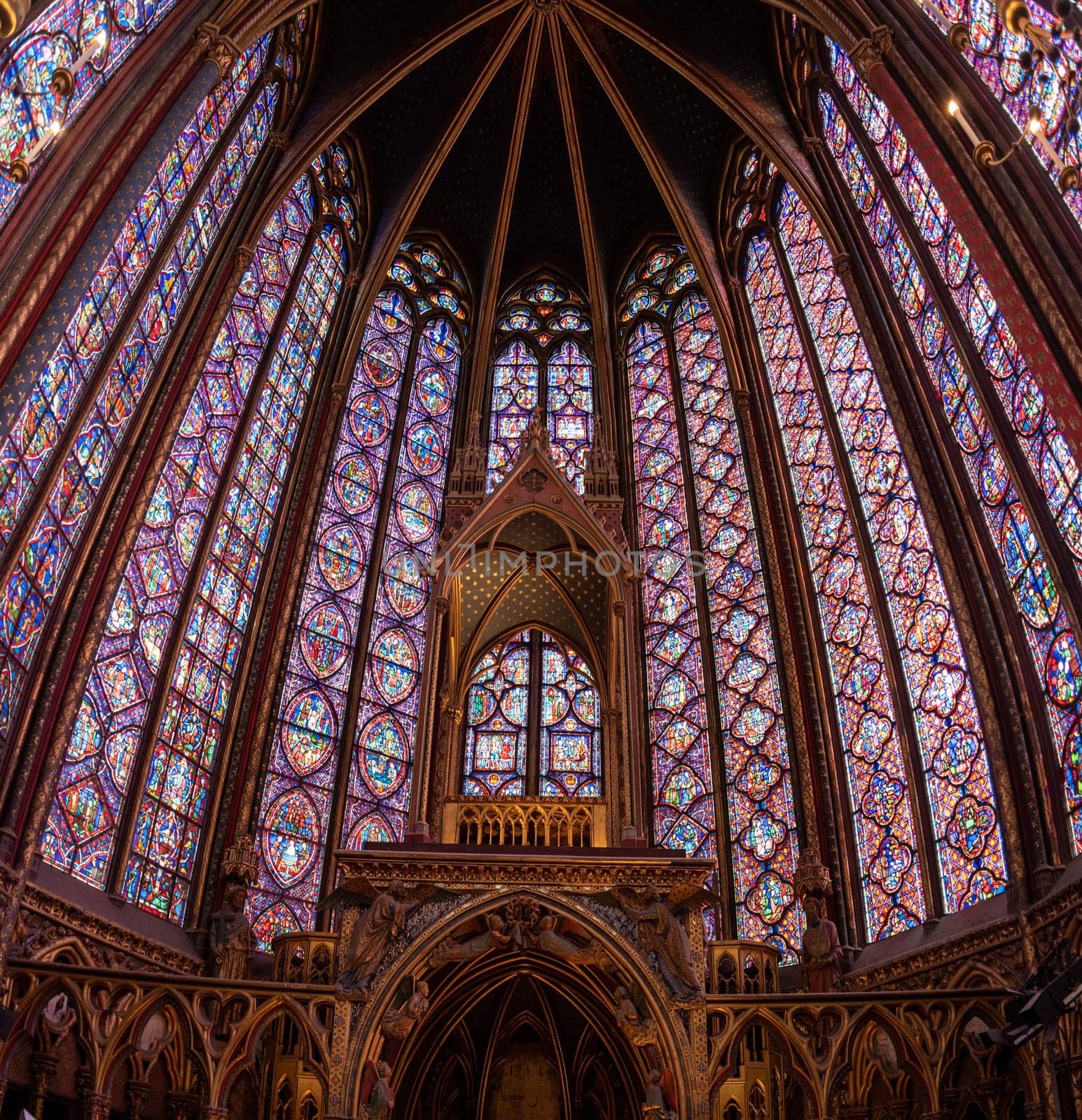 The inside of the famous Sainte Chapelle in Paris with impressing colorful windows, France