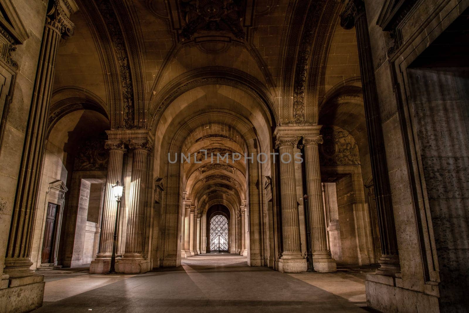 The famous Louvre Palace of Paris at night, France