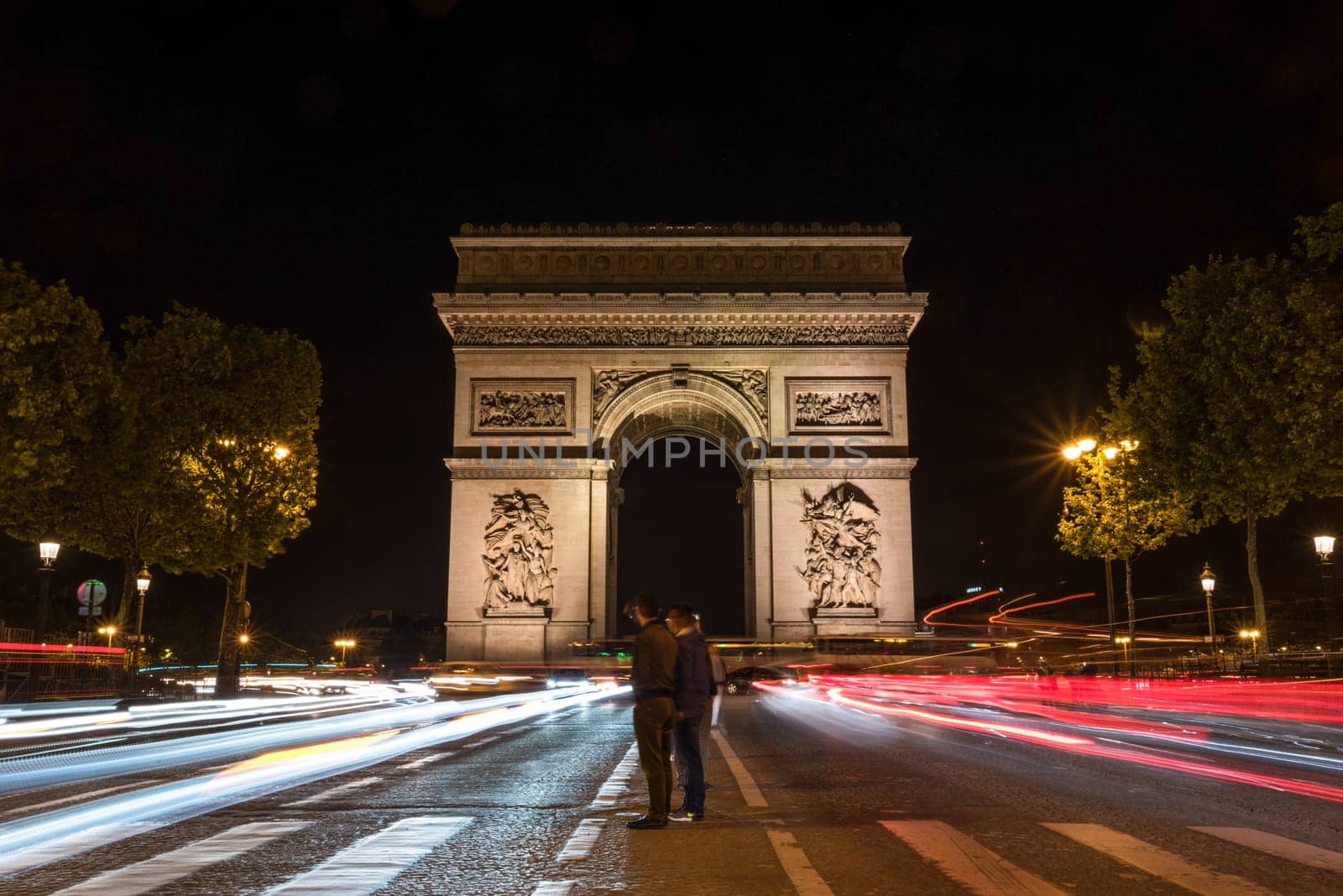 Nightly traffic on the Champs-Elysees, Arc de Triomph in the background, Paris, France