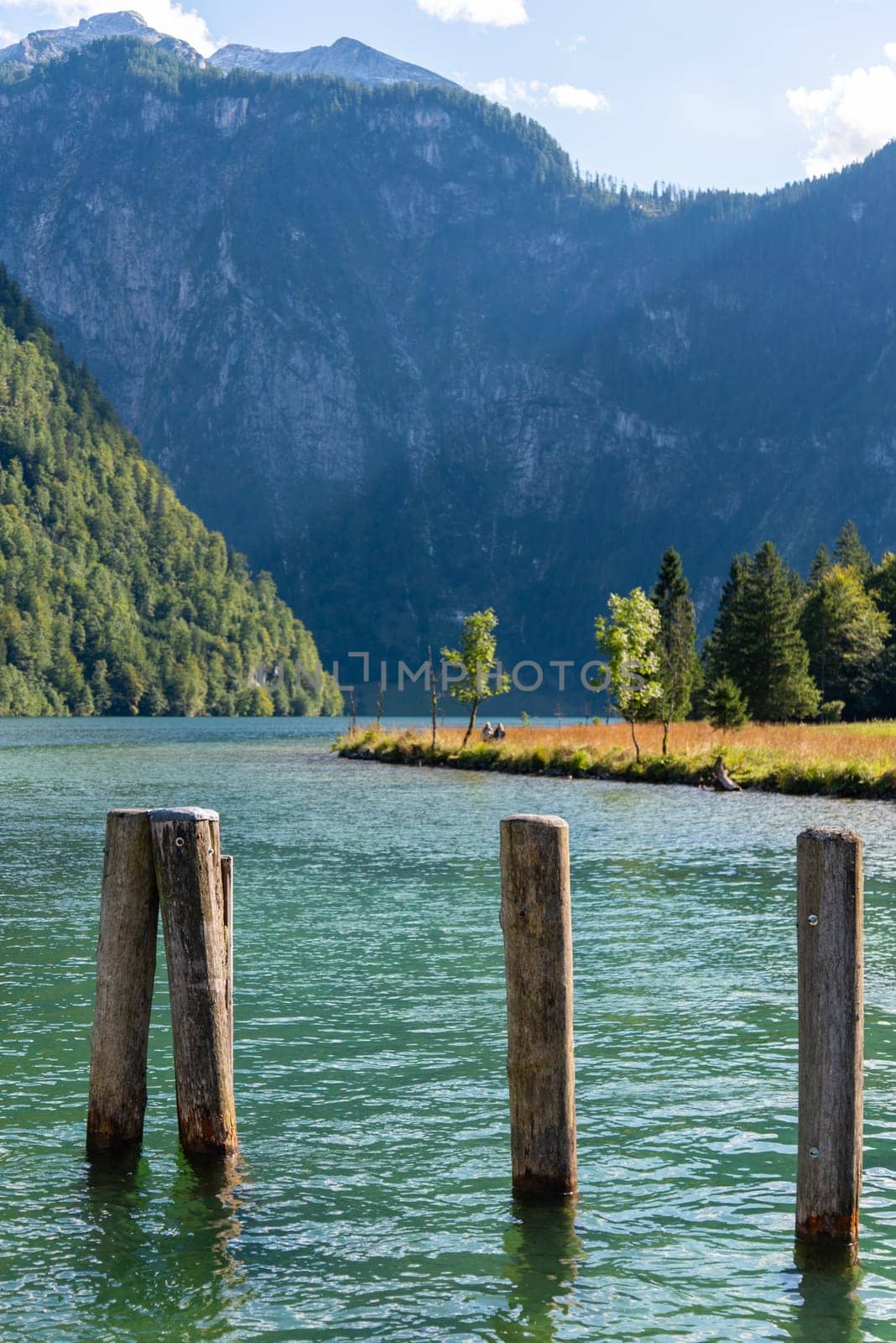 Bollards at the Pier Saint Bartholomew at the upper Lake Koenigssee in Bavaria, Germany