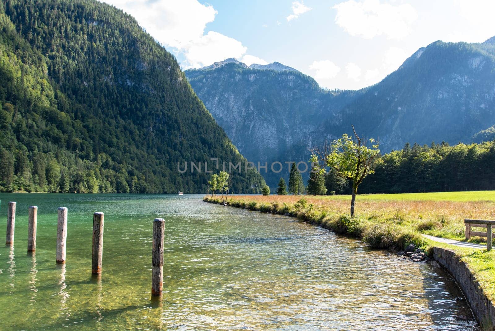 Bollards at the Pier Saint Bartholomew at the upper Lake Koenigssee in Bavaria, Germany