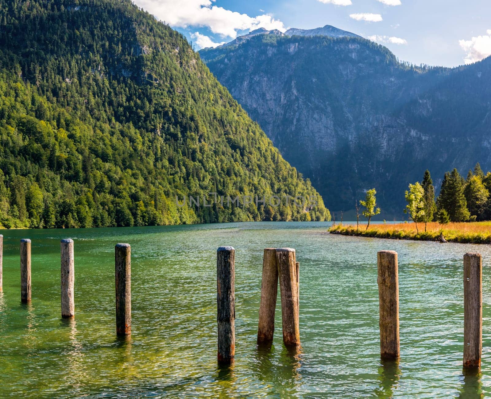 Bollards at the Pier Saint Bartholomew at the upper Lake Koenigssee in Bavaria, Germany