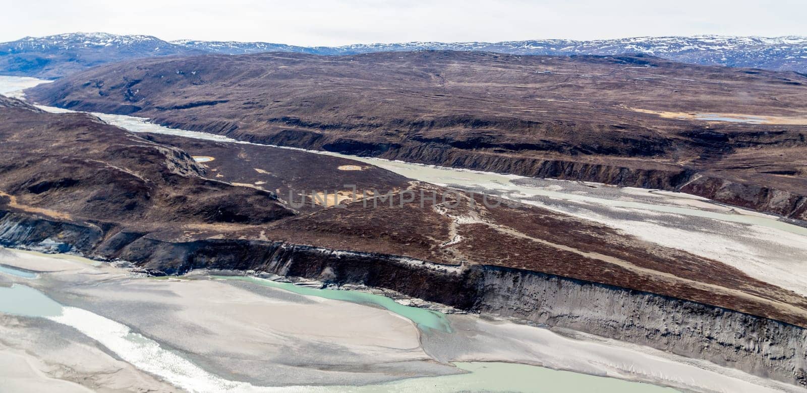 Greenlandic tundra landscape with  river from ice cap melting, aerial view, near Kangerlussuaq, Greenland