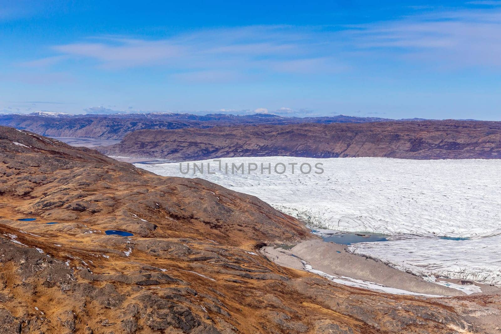 Greenlandic tundra landscape with  ice cap melting, aerial view, near Kangerlussuaq, Greenland