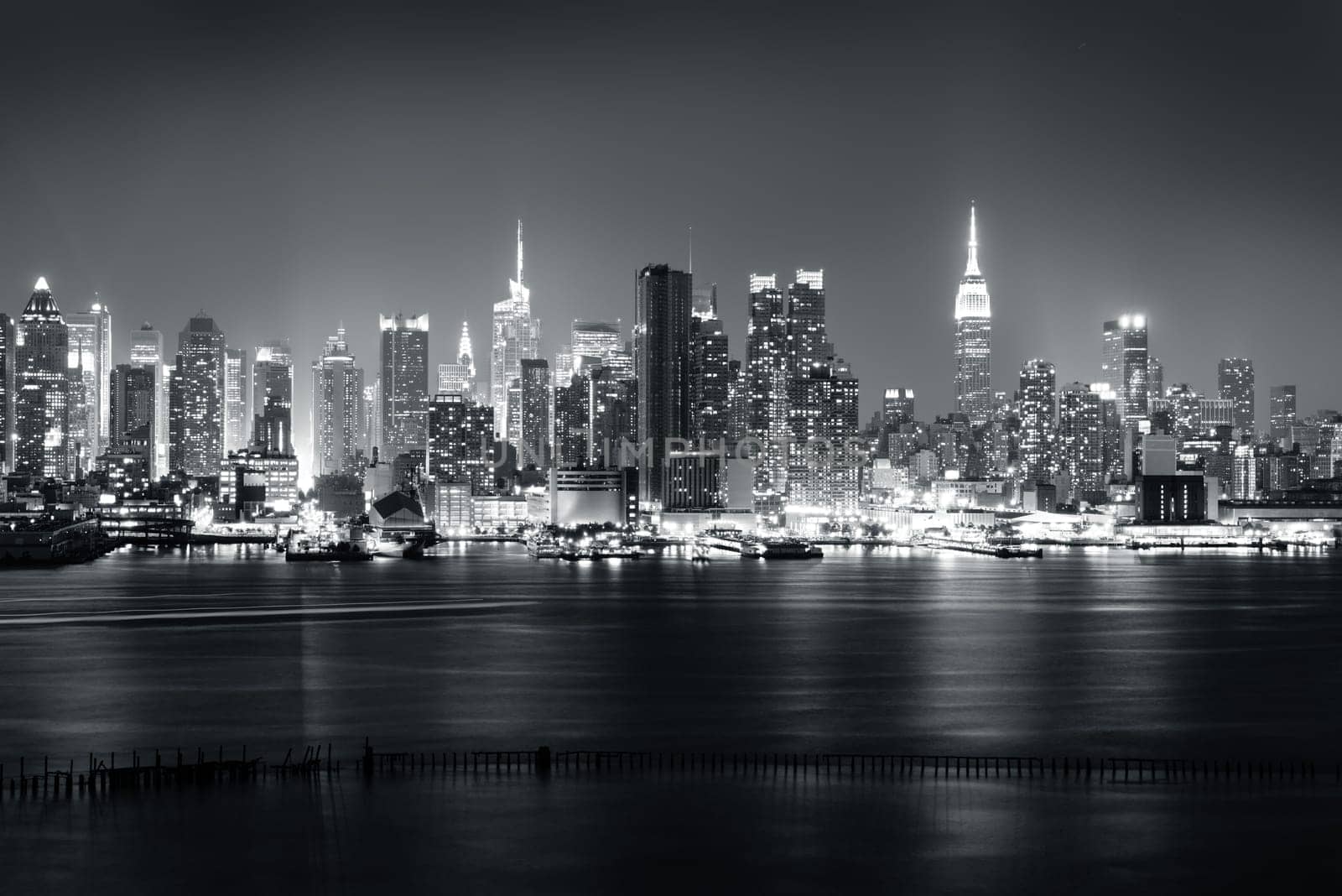 New York City skyline with urban skyscrapers at sunset, USA.
