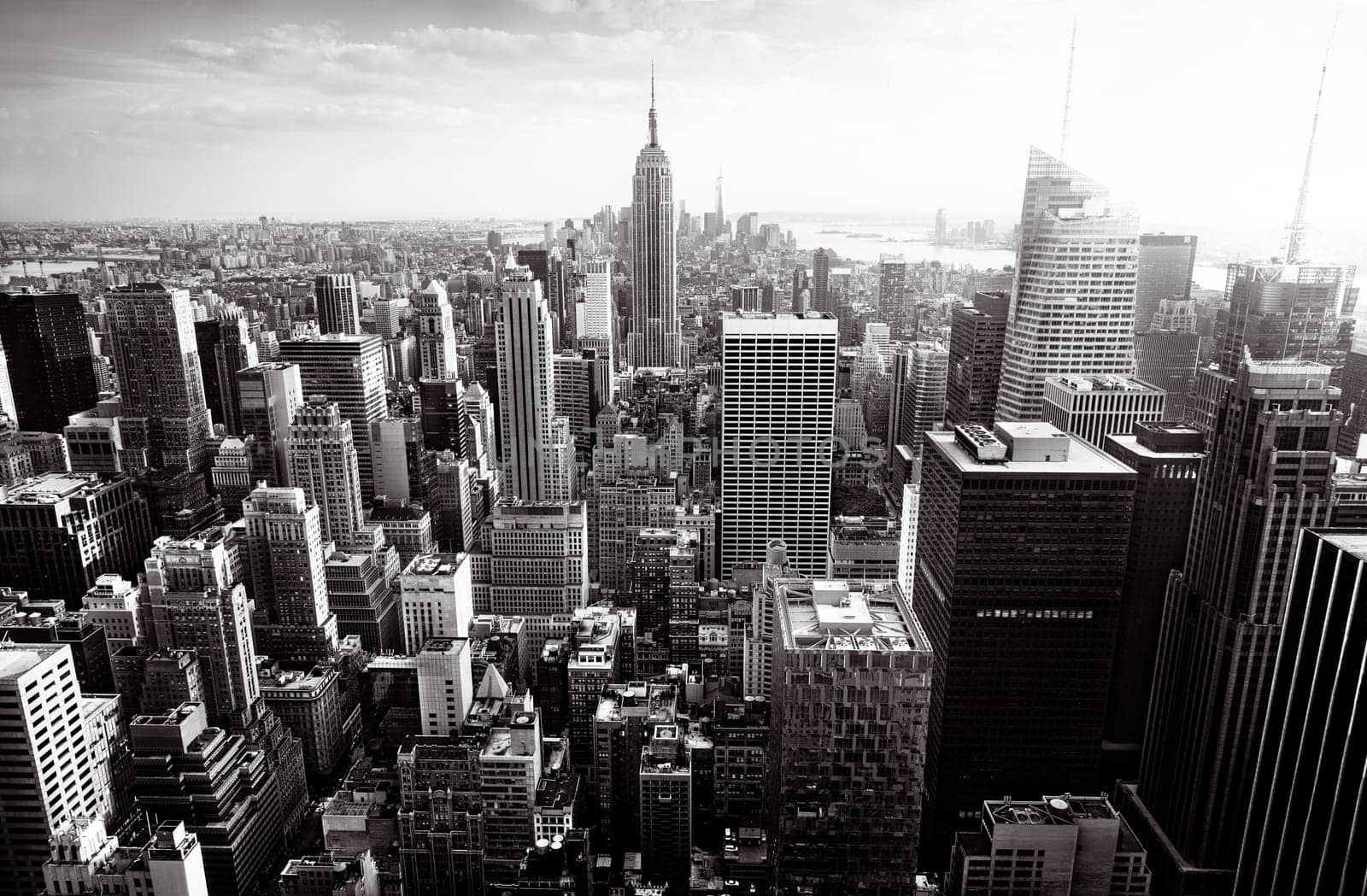 New York City skyline with urban skyscrapers at sunset, USA.