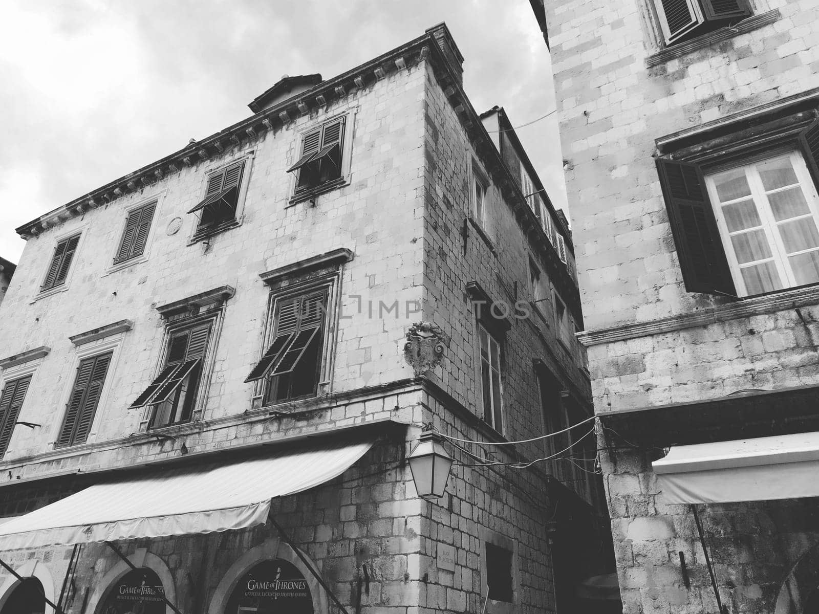 Stradun, Stradone is the main street of the historic city center of Dubrovnik in Croatia. architectural sights. A popular place for tourist walks. August 14, 2022 Black and white.