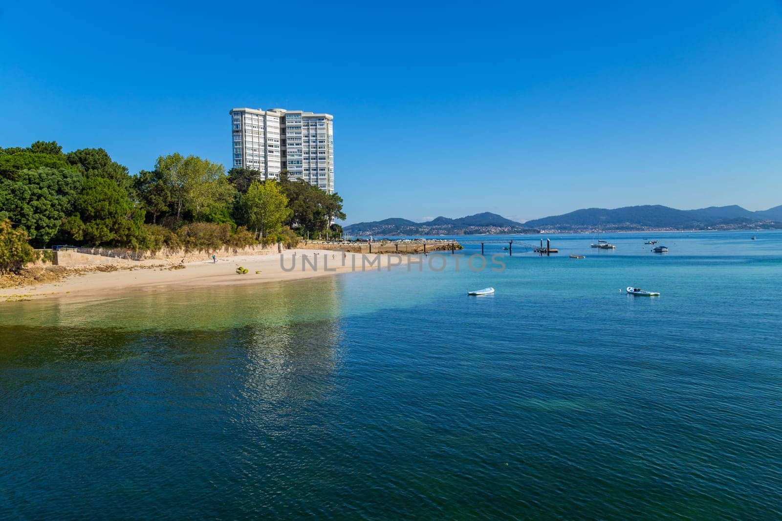 Vigo, Spain - July 27, 2022: People in Samil beach in a summer day, Vigo. Spain