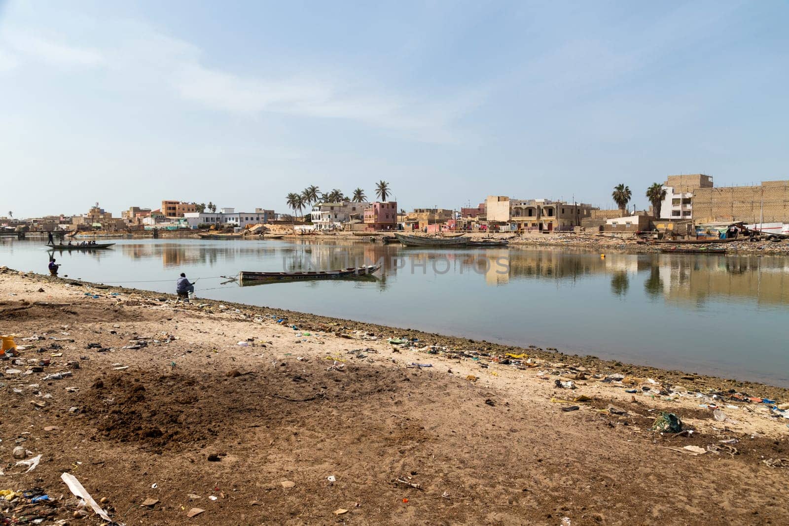 Saint Louis, Senegal: 28 January 2019 - Fishing boats resting on the riverbank of the river Senegal