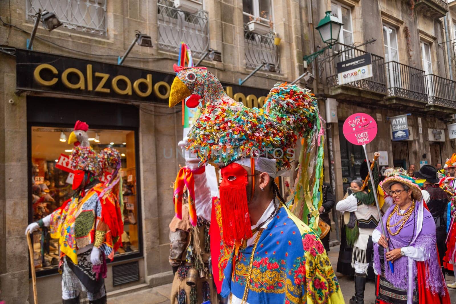 Santiago de Compostela, Spain - August 25, 2022: A colorful carnival parade in the streets of Santiago de Compostela, Galicia, Spain