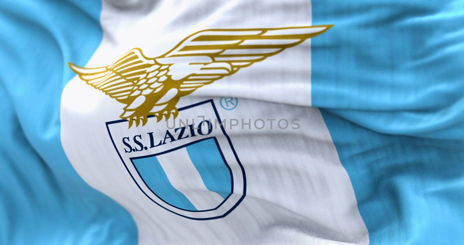 Rome, Italy, July 2022: Detail of SS Lazio flag waving. SS Lazio is a professional football club based in Rome. Illustrative editorial. Rippled fabric. Textured background. 3d illustration. Close-up