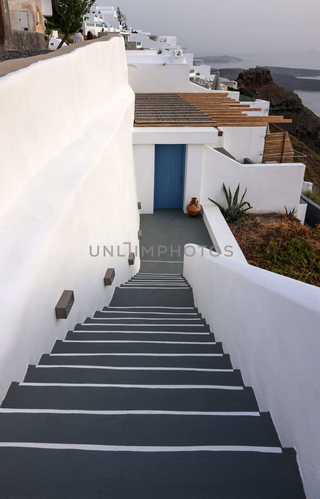 Narrow stone steps, a traditional piece of architecture on the island of Santorini. Greece