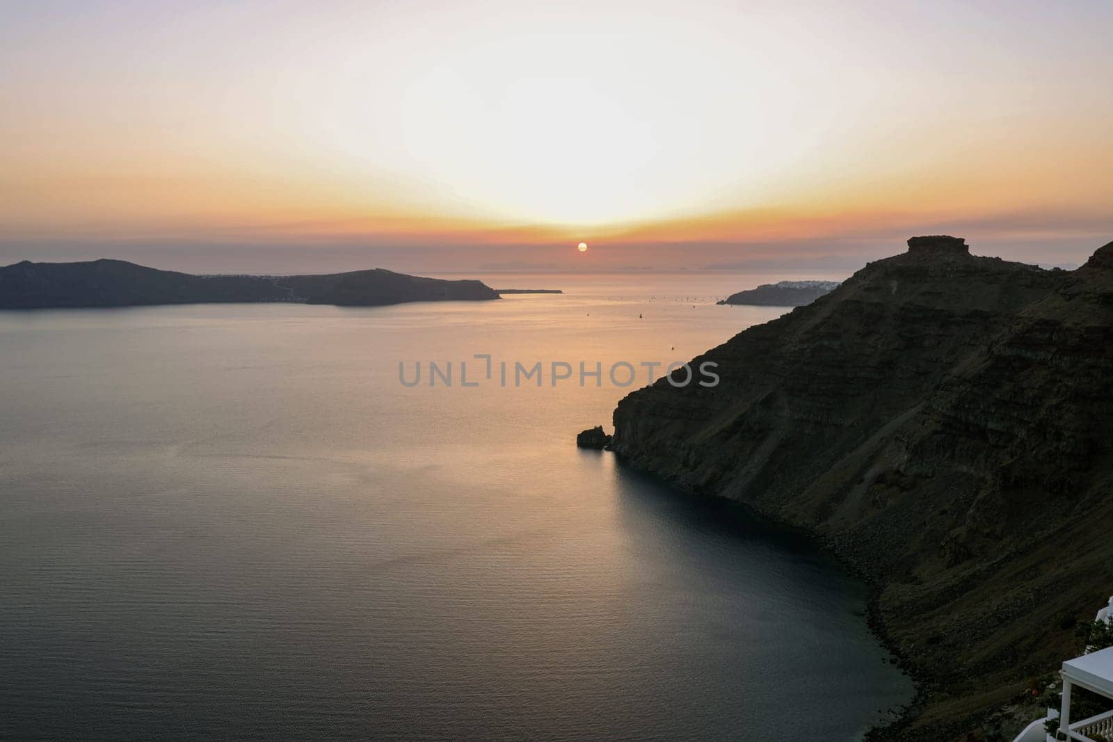 Sunset over Santorini as seen from Fira. Cyclades, Greece