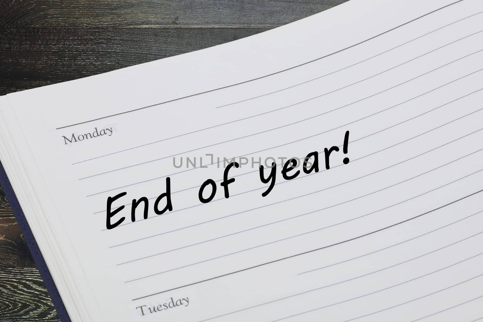 An end of year reminder note in a diary page
